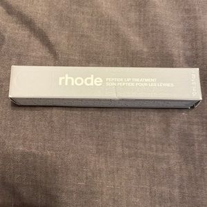 Brand new never used Rhode Lip Treatment Gloss